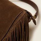 Close-up of fringe stitching and texture on Brown western fringed hobo bags