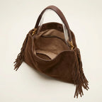 Interior lining and pockets of Brown western fringed hobo bags