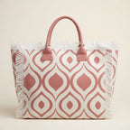 Back panel of Pink & White white fringe beach bag with strap attachments