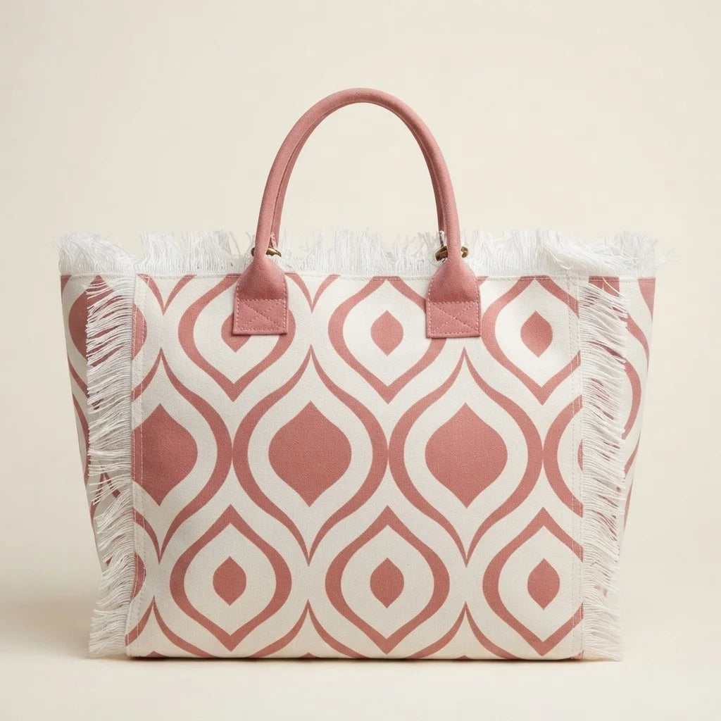 Back panel of Pink & White white fringe beach bag with strap attachments
