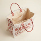 Interior lining and pockets of Pink & White white fringe beach bag