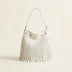 White white fringe bucket bag, front view