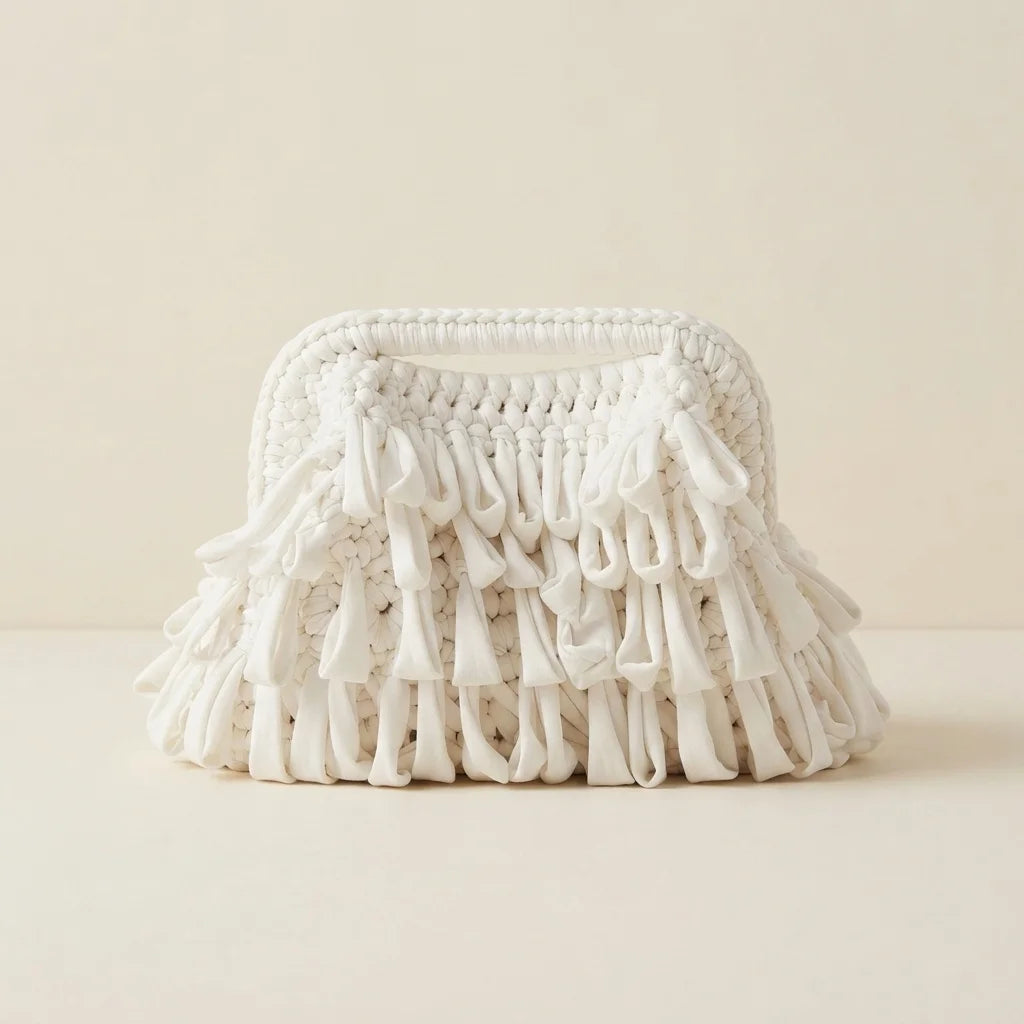 White white fringe clutch bag, front view