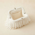 Interior lining and pockets of White white fringe clutch bag