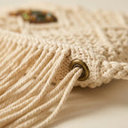 Close-up of fringe stitching and texture on White white fringe crossbody bag