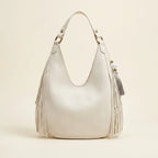 Back panel of White white fringe hobo bag with strap attachments