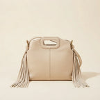 Back panel of Cream white fringe shoulder bag with strap attachments