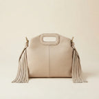 Cream white fringe shoulder bag, front view
