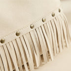 Close-up of fringe stitching and texture on Ivory white fringe tote bag