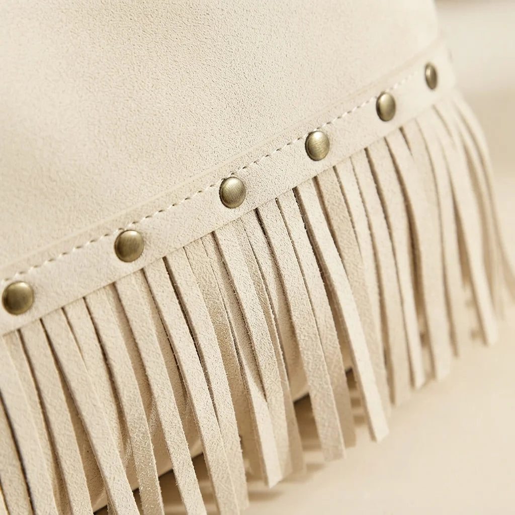 Close-up of fringe stitching and texture on Ivory white fringe tote bag