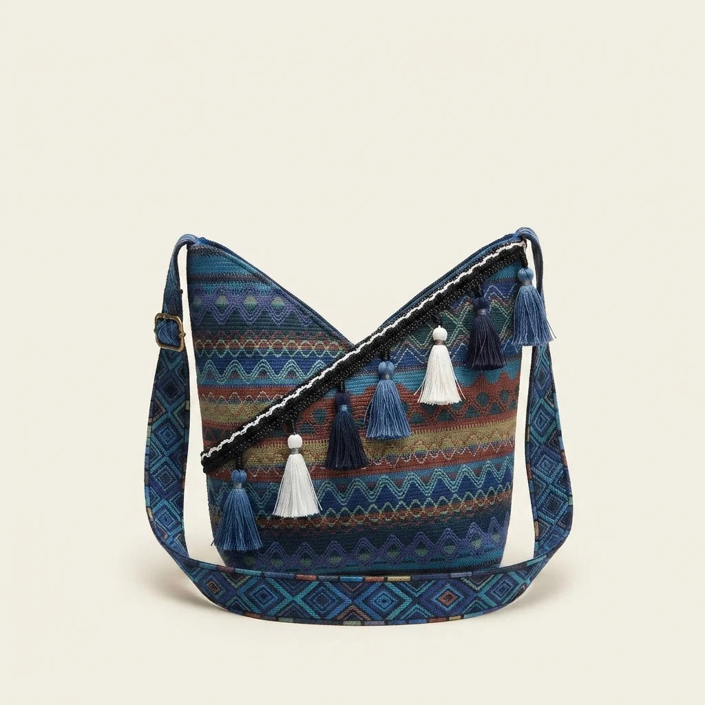 Blue woven fringe bag, front view