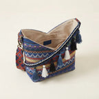 Interior lining and pockets of Blue woven fringe bag