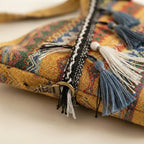 Close-up of fringe stitching and texture on Yellow woven fringe bag