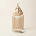 Beige wristlet fringe bag, front view